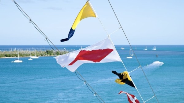 nautical flags flying over an anchorage